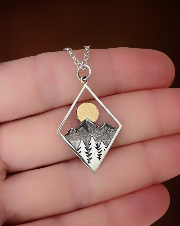 Made-to-order mountain & moon necklace in silver and bronze