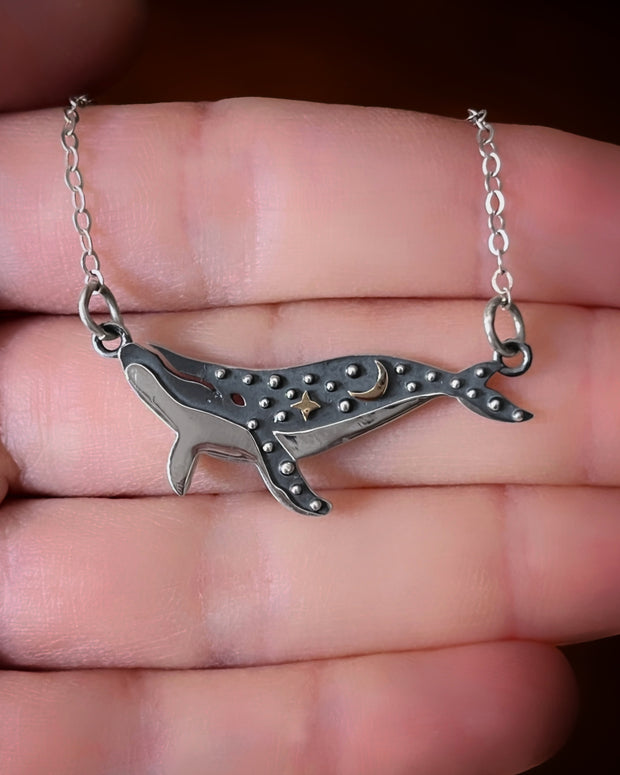 Whale necklace in silver and bronze